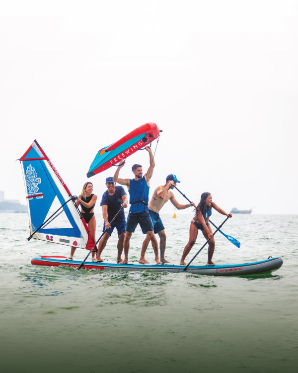 Starship inflatable paddle board with blue red design and sail